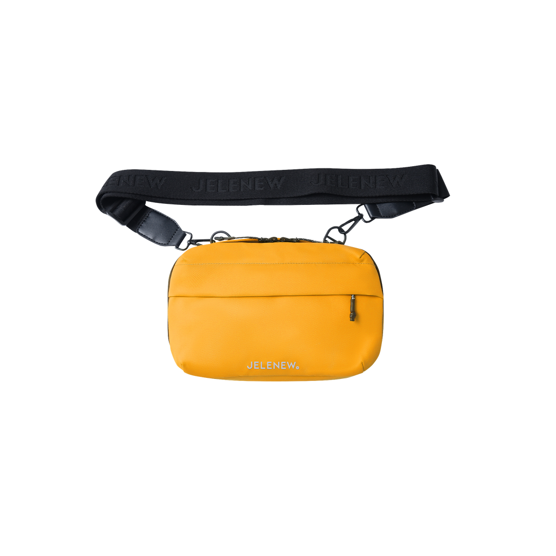Yellow handlebar bag with black adjustable strap and multiple compartments for organized storage
