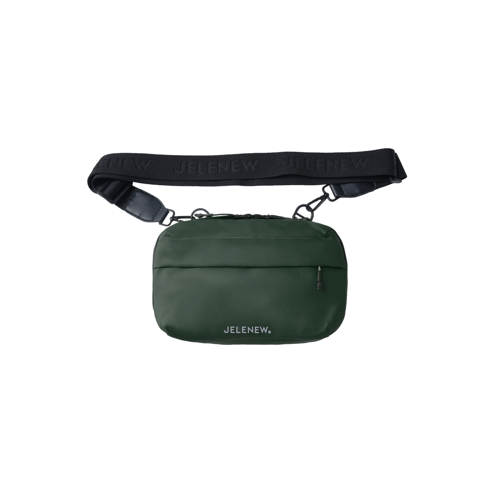 Compact green handlebar bag with adjustable black strap and multiple compartments for organized storage