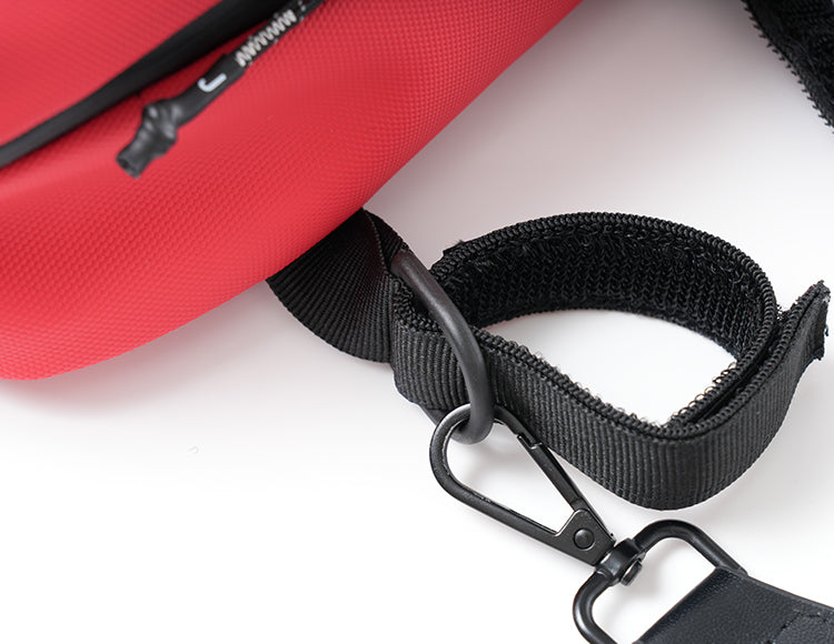 Red handlebar bag with black adjustable strap and zipper for organized storage