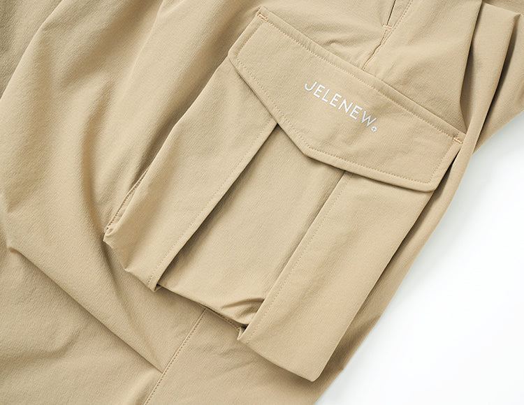 Beige relaxed-fit drawstring cargo pants with large functional pocket